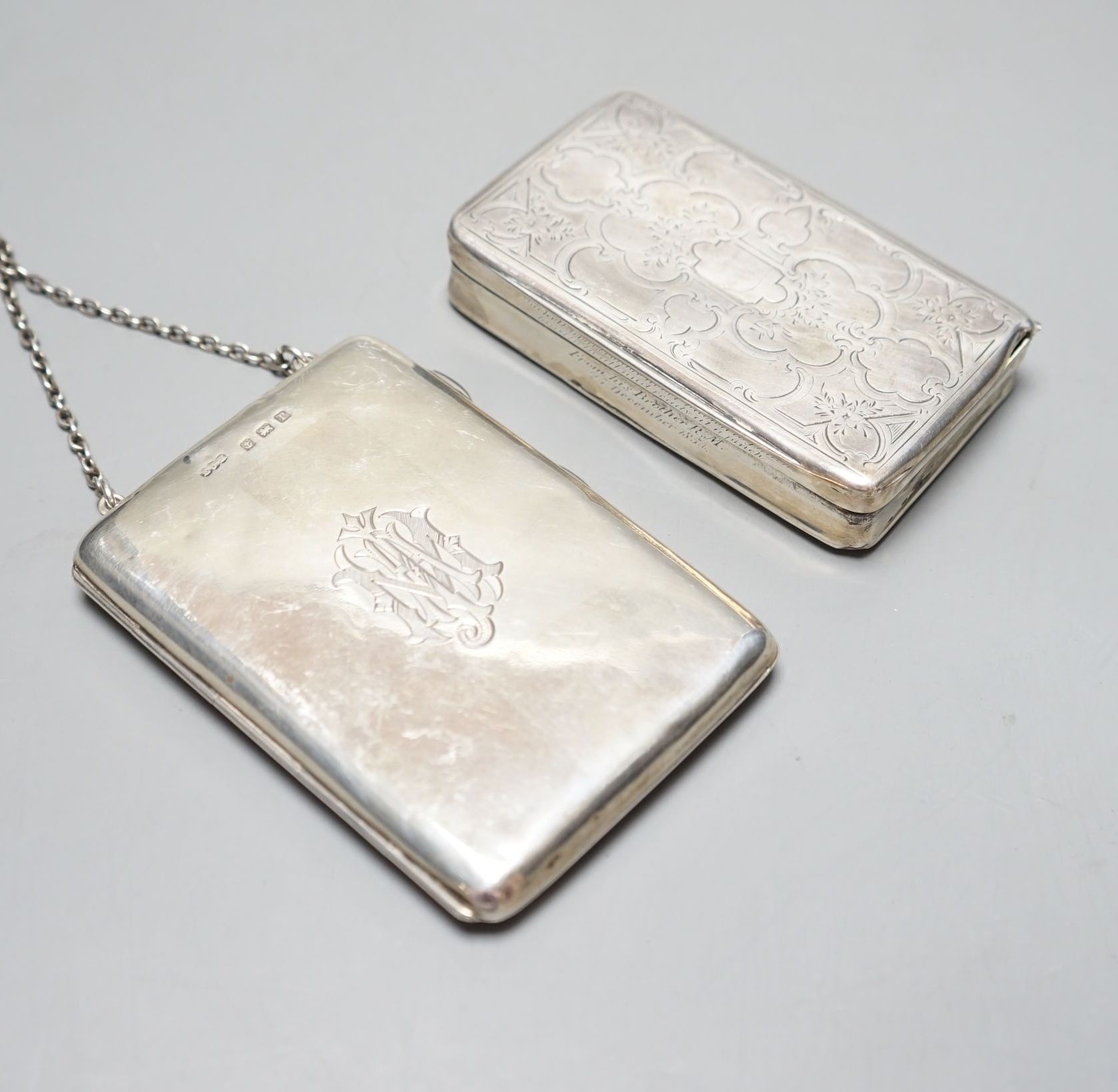 A Dutch white metal snuff box, 92mm and a George V silver card case/purse, Birmingham, 1916.